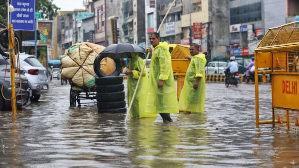Waterlogging in different parts of Noida and Delhi after heavy rainfall in the region, at New Delhi on Tuesday, July 28, 2026. Express photo by Abhinav Saha