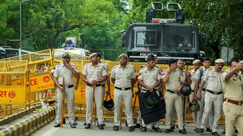 Delhi Police personnel guard at Jantar Mantar during the ongoing protest over the alleged NEET-UG examination irregularities. (PTI Photo/Atul Yadav)