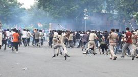 Delhi Police use lathi charge and tear gas shells to disperse CJP Supporters during their march to parliament. Express photo by Anil Sharma