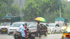 Heavy rains lashed in Pune on Friday, disrupting daily life. (Express photograph by Arul Horizon)