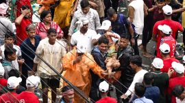 An injured person being carried out of the crowd during the Jagannath Rath Yatra. (PTI Photo/Enhanced by AI)