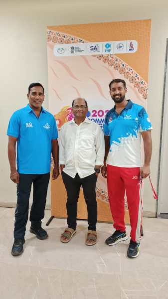 Challa Ramu with Valluri Srinivas Rao and a weightlifter. (Special arrangement)