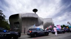 Police respond to a shooting at Seattle Center during the Bite of Seattle food festival Sunday, July 26, 2026, in Seattle, Wash. (AP Photo/Lindsey Wasson)