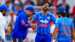 India captain Shreyas Iyer, second right, receives treatment for an injury during the second T20 cricket match between England and India in Manchester, England, Saturday, July 4, 2026. (AP Photo)