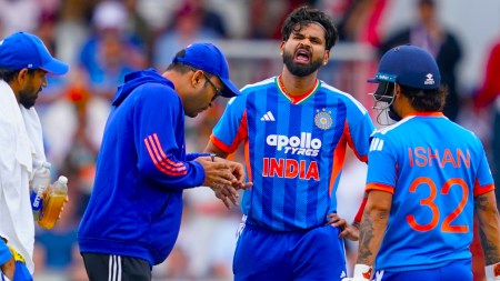 India captain Shreyas Iyer, second right, receives treatment for an injury during the second T20 cricket match between England and India in Manchester, England, Saturday, July 4, 2026. (AP Photo)