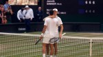Jannik Sinner embraces Novak Djokovic after winning the 2026 Wimbledon semi final (REUTERS Photo)