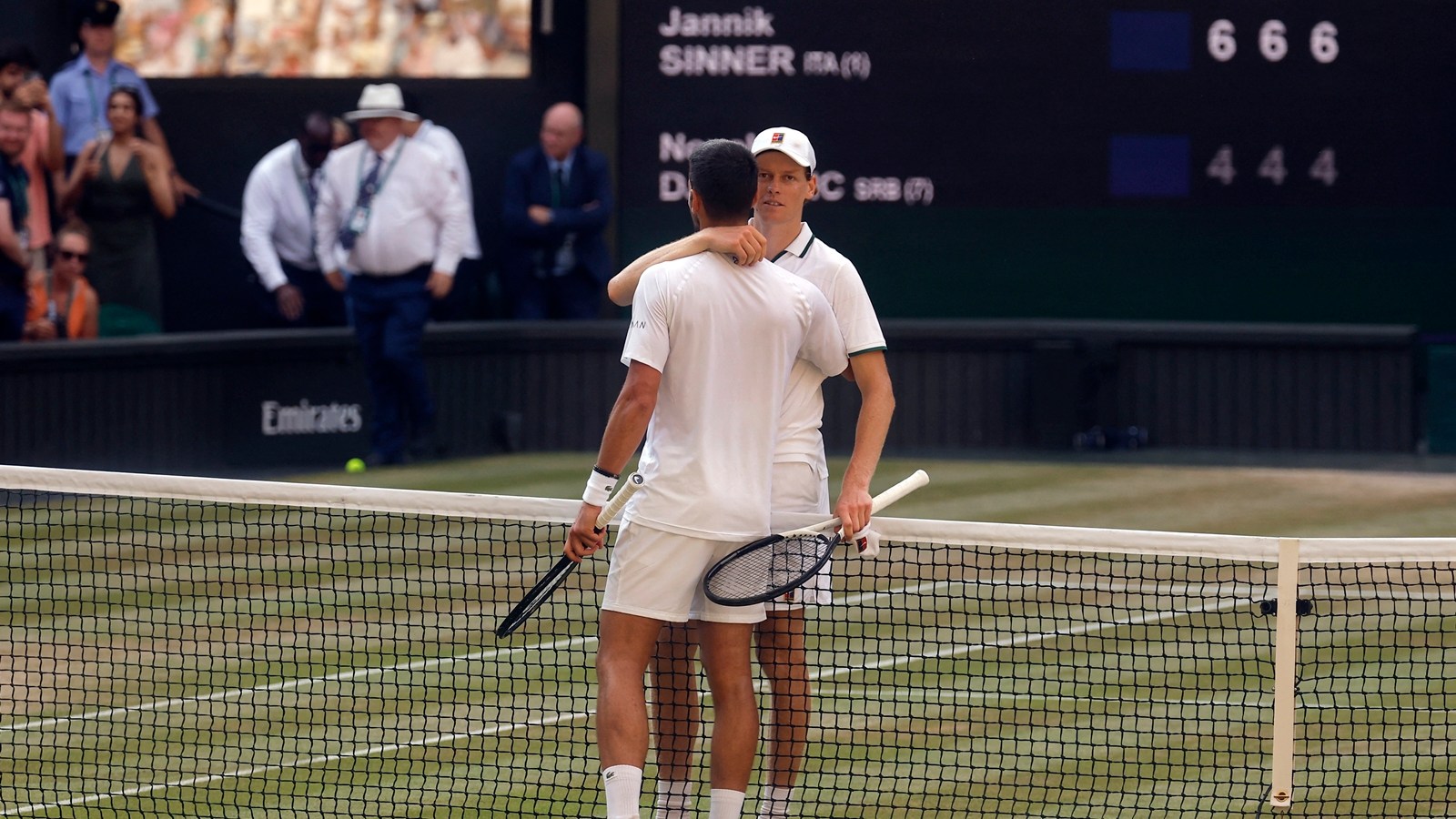 Jannik Sinner embraces Novak Djokovic after winning the 2026 Wimbledon semi final (REUTERS Photo)