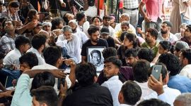 CJP founder Abhijeet Dipke holds a portrait of environmentalist Sonam Wangchuk after announcing his own indefinite hunger strike following Wangchuk's hospitalisation, in New Delhi on Saturday. (ANI Photo)