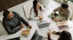 Employees in a workplace meeting