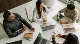 Employees in a workplace meeting