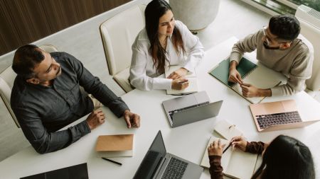 Employees in a workplace meeting