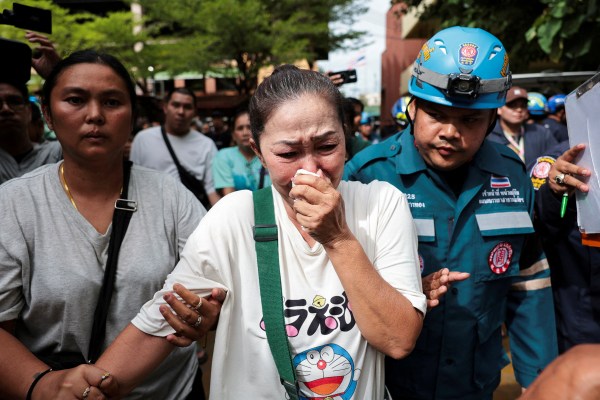 A relative of a victim reacts at Debsirin Nonthaburi School following the shooting incident that took place at the school, in Bang Kruai district, Nonthaburi province on the outskirts of Bangkok, Thailand, August 7, 2026. (REUTERS)