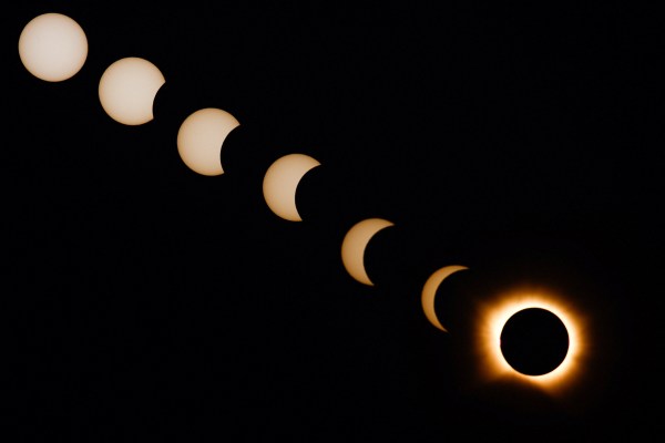 A composite image of seven separate photographs taken with a single fixed camera shows stages of a solar eclipse before, during and after totality, as seen from Arija, Spain, August 12, 2026. (REUTERS)