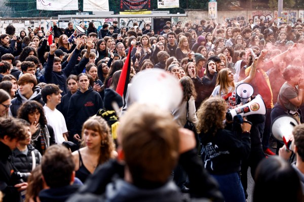 Young demonstrators protest against Italy's Prime Minister Giorgia Meloni on the occasion of a "No-Meloni day" rally in Rome, Italy, November 14, 2025. (REUTERS)