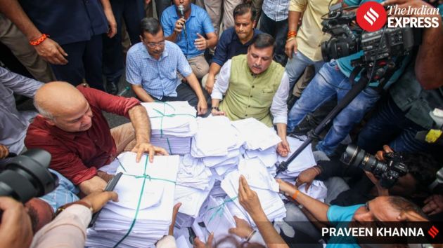 AAP party leaders, sat on the road after being stopped by the police