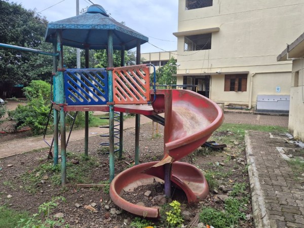 A broken slide lies damaged in the pre-school play area (Shubham Kurale)