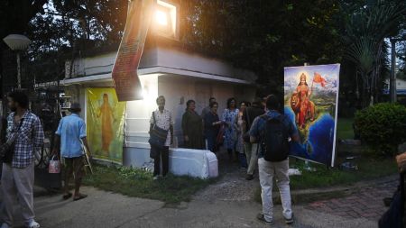 A group of BJP workers led by the party's Shibpur MLA Rudranil Ghosh, who is also a film actor and director, gathered at the Academy premises and repainted the ticket counter room saffron amid chants of "Jai Shri Ram" and "Vande Mataram". (Express Photo)