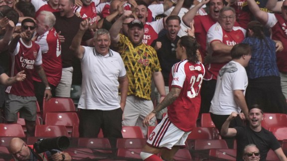 Arsenal's Riccardo Calafiori celebrates after scoring the opening goal during the FA Community Shield final soccer match between Arsenal and Manchester City in Cardiff, Wales, Sunday, Aug.16, 2026. (AP Photo/Alastair Grant)