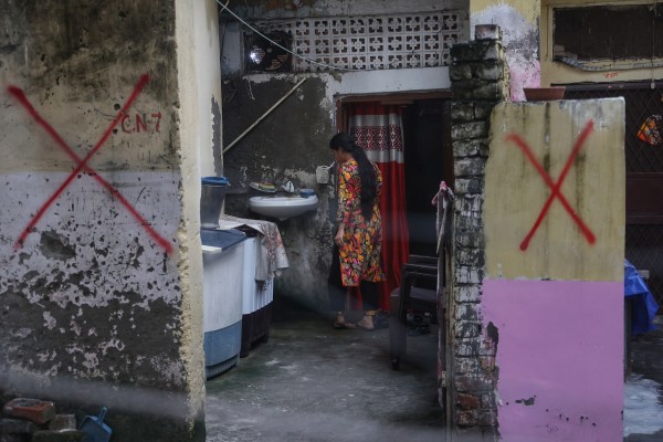 Large crosses painted on dwellings at Bhai Ram Camp slum cluster near the Prime Minister’s official residence on August 26, 2026. 