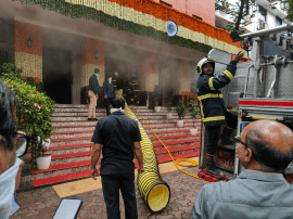 Fire broke out inside Mumbai’s Aayakar Bhavan on Monday afternoon. (Express Photo by Ganesh Shirshekar, Image enhanced using AI)
