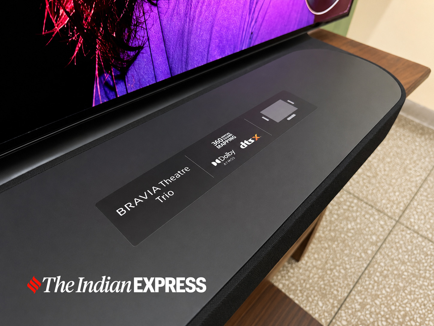 The Sony BRAVIA Theatre Trio features a sleek, minimalist design that complements a modern home entertainment setup.