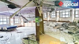 A section on the second floor of Delhi State Cancer Institute lying in ruins. (Express Photo by Tabshir Shams)