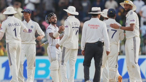 Sri Lanka's Sonal Dinusha is congratulated by the India's team members at the end of the day five of the second cricket test match between Sri Lanka and India in Colombo, Sri Lanka, Thursday, Aug. 27, 2026. (AP Photo/Eranga Jayawardena)