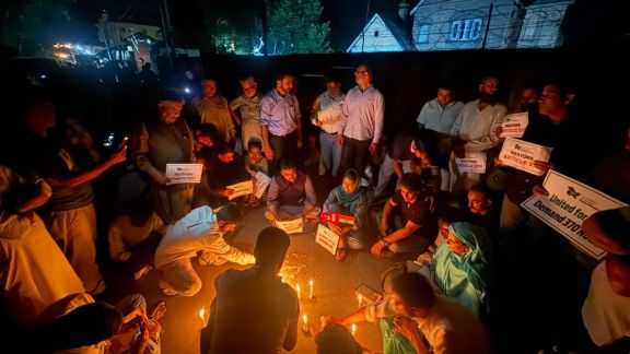 A protest by PDP on the eve of seventh anniversary of Article 370 abrogation in Srinagar on Tuesday. (Express Photo); Iltija Mufti protest