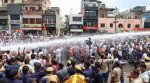 Police use water cannons to disperse Congress workers during the 'Hisab Mango' (Demand Accountability) rally at the Jaipur Municipal Corporation office, in Jaipur on Monday. (ANI Photo)
