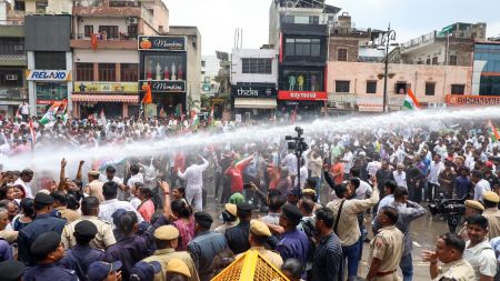 Police use water cannons to disperse Congress workers during the 'Hisab Mango' (Demand Accountability) rally at the Jaipur Municipal Corporation office, in Jaipur on Monday. (ANI Photo)