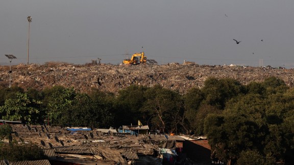 rehab of families in Adani Dharavi project, Adani Dharavi project, Navayuga Engineering Company Limited, Right to Information Act, BMC, NECL, Mumbai news, Maharashtra news, Indian express, current affairs