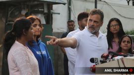 Opposition Leader in Lok Sabha Rahul Gandhi with Cockroach protester during addressing media person at outside10 janpath in new delhi on wednesday.Express photo by Anil Sharma