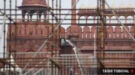 Workers are seen making preparations for the forthcoiming Independence day celebrations at the Red fort in Delhi on Wednesday. Express Photo by Tashi Tobgyal