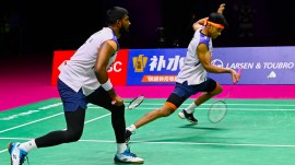 India's Satwiksairaj Rankireddy, left, and Chirag Shetty play against China's Liang Wei Keng and Wang Chang during a quarter final match of the Badminton World Championships in New Delhi. (AP Photo)