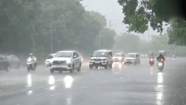 Dark monsoon clouds hover over Delhi as the IMD predicts moderate to heavy rain and generally cloudy skies across the national capital. (Image: ANI)