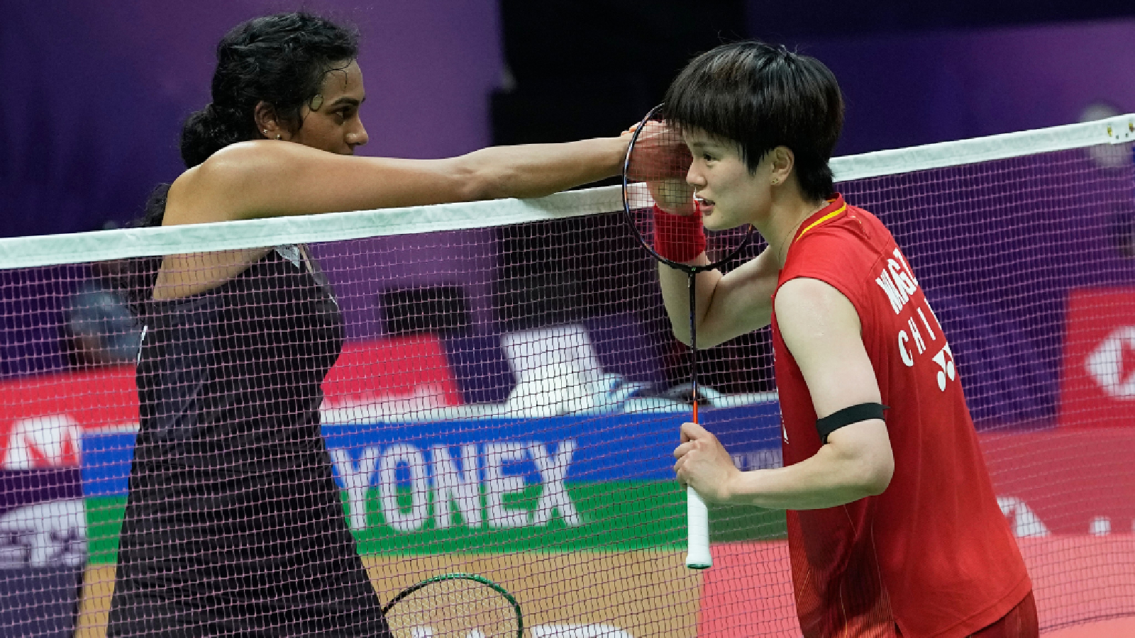 China's Wang Zhi Yi, right, and India's Pusarla V. Sindhu greet each other at the end of their match during the Badminton World Championships in New Delhi, India, Thursday, Aug. Dec. 20, 2026. (AP Photo/Manish Swarup)