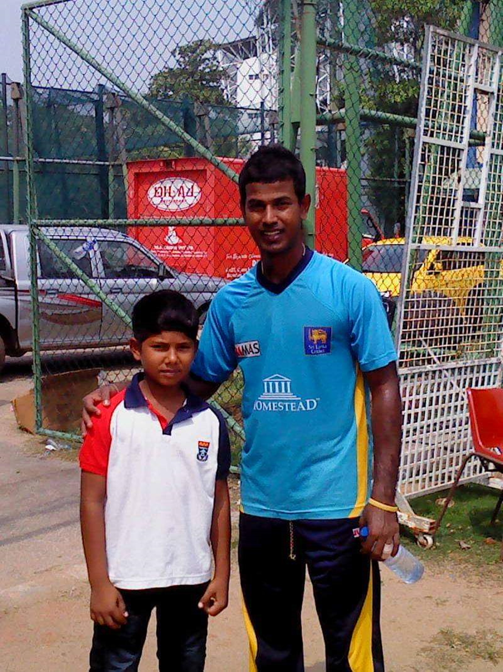 A young Sonal Dinusha with former Sri Lankan pacer Nuwan Kulasekara