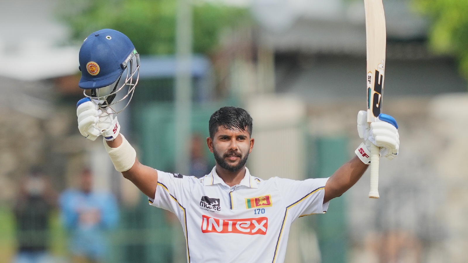 Sri Lanka's Sonal Dinusha celebrates his century during day five of the second cricket test match between Sri Lanka and India in Colombo, Sri Lanka, Thursday, Aug. 27, 2026.