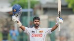Sri Lanka's Sonal Dinusha celebrates his century during day five of the second cricket test match between Sri Lanka and India in Colombo, Sri Lanka, Thursday, Aug. 27, 2026. (AP Photo/Eranga Jayawardena)