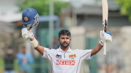Sri Lanka's Sonal Dinusha celebrates his century during day five of the second cricket test match between Sri Lanka and India in Colombo, Sri Lanka, Thursday, Aug. 27, 2026. (AP Photo/Eranga Jayawardena)