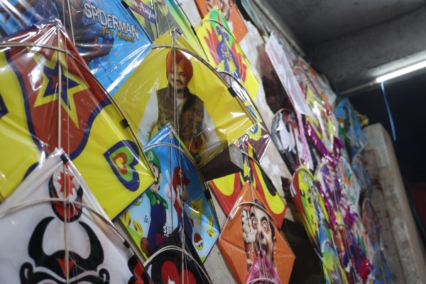 People buy kites at the Lal Kuan market, Delhi ahead of the Independence day celebrations. (Express Photo