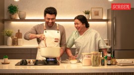 Suriya with Radikaa Sarathkumar in a still from Vishwanath and Sons, directed by Venky Atluri