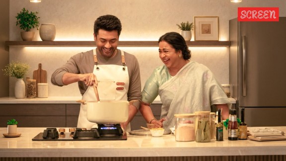 Suriya with Radikaa Sarathkumar in a still from Vishwanath and Sons, directed by Venky Atluri