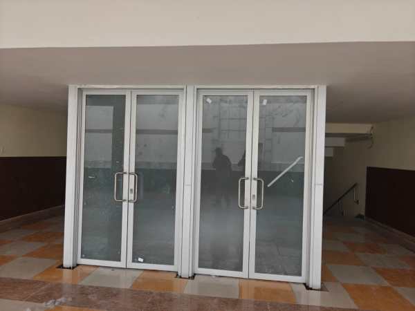 Glass gates installed at IG Indoor Stadium in New Delhi. (Pritish Raj)