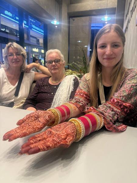 Pia with her mother-in-law and mother (both Germans), showing mehendi on her palms. (Photo: Divya Goyal)