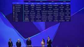 Soccer Football - UEFA Champions League - League Phase Draw - Grimaldi Forum, Monaco - August 27, 2026 UEFA Deputy Secretary General Giorgio Marchetti, former footballers Thierry Henry and David Villa and presenters Pedro Pinto and Reshmin Chowdhury look on as the screen shows the fixtures of pot 4 ahead of the league phase REUTERS/Manon Cruz