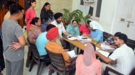 People submit their documents to the Booth Level Officer during a special camp organized as part of the ongoing Special Intensive Revision of the electoral roll at Model Town in Patiala.