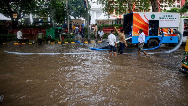 Pumps deployed by the NDMC drain out the water. (EXPRESS PHOTO BY PRAVEEN KHANNA)