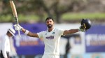 Devdutt Padikkal cdelebrates his maiden Test century on day 1 of the first Test between India and Sri Lanka in Galle. (BCCI/Creimas Photo)