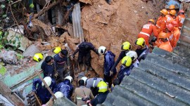 Heavy rain triggers landslides in Ghatkopar; seven killed, including three children, while seven others sustain injuries as hillside debris crashes onto houses. Express photo by Deepak Joshi